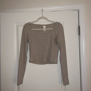 Long sleeve light brown shirt. Size medium and brand is h&m